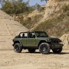 The 2022 Jeep® Wrangler Willys with the Xtreme Recon Package on driving on sand