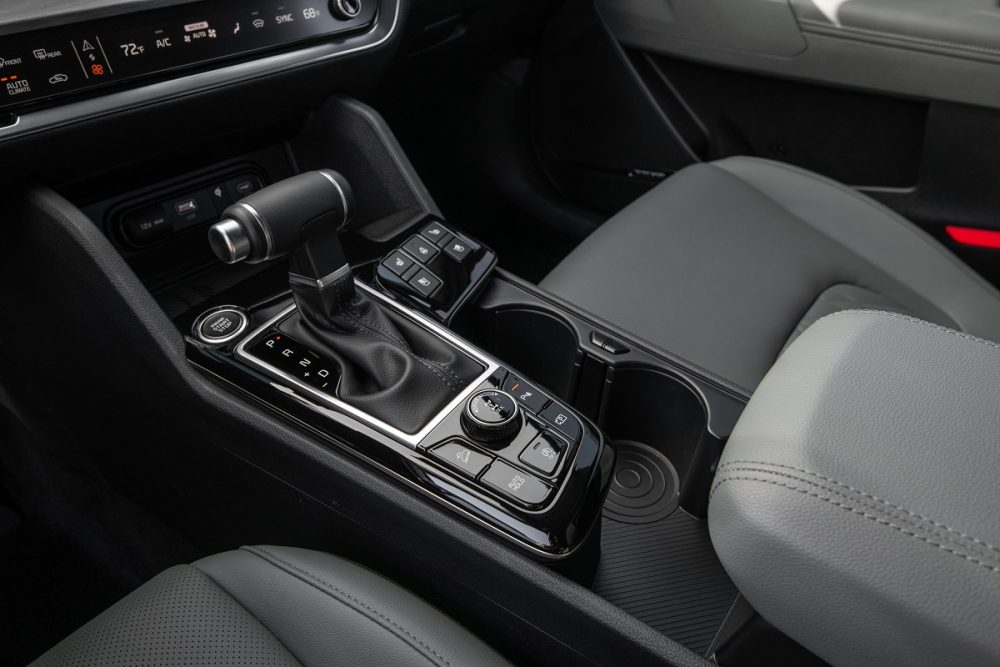 Close up of the interior center console area in the 2023 Kia Sportage X-Pro