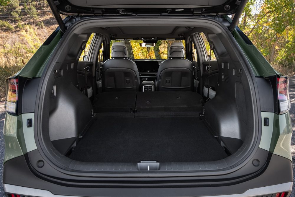 Interior rear view of the 2023 Kia Sportage X-Pro cargo area with the rear seats folded down