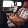 Lincoln Aviator Shinola Concept with Shinola duffle bag in second row