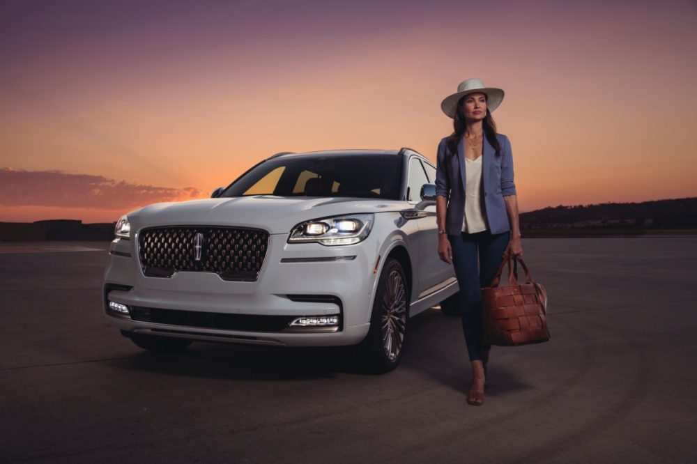 Lincoln Aviator Shinola Concept and woman with Shinola duffle bag