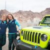 Nena Barlow and Teralin Petereit standing by their Wrangler Rubicon 4xe