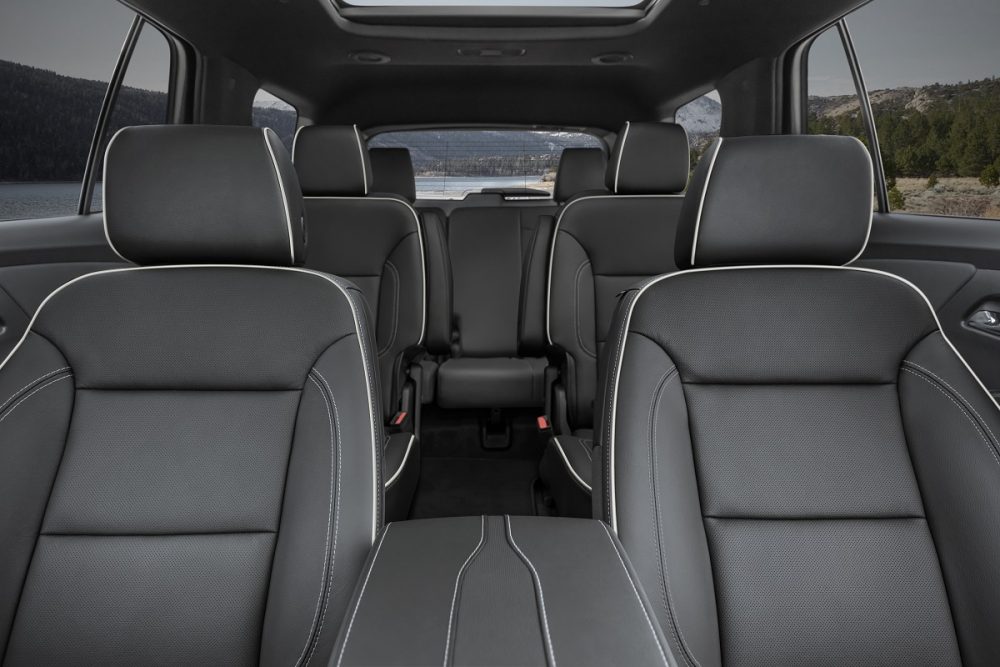 Looking backward from front seat, a view of Chevrolet Traverse Premier's three seating rows 