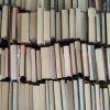 Multiple piles of books viewed from the top