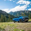 Front side view of 2022 Chevrolet Colorado parked in mountain meadow