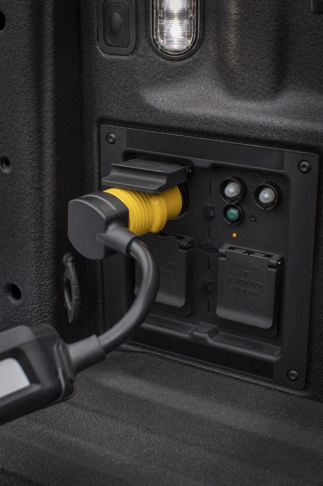 Pro Power Onboard 120-volt outlets with adapter for vehicle-to-vehicle EV charging