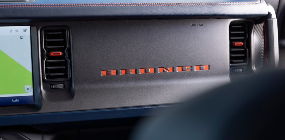 2022 Ford Bronco Raptor interior in Rhapsody Blue Bronco lettering in Code Orange