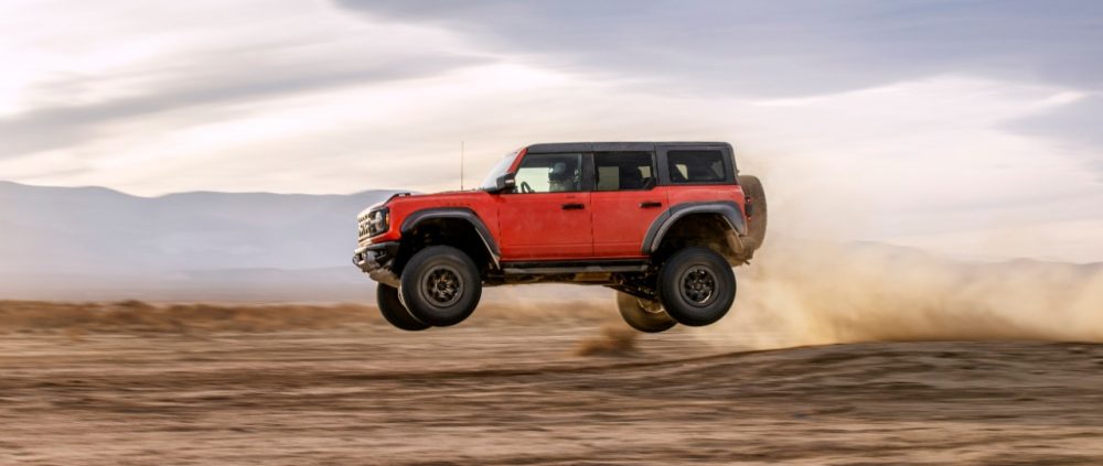 2022 Ford Bronco Raptor leaping over desert
