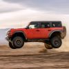 2022 Ford Bronco Raptor leaping over desert