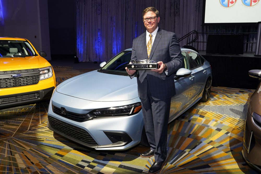 Honda North Central Zone Manager Matt Almond accepts 2022 North American Car of the Year for the Honda Civic