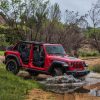 2022 Jeep® Wrangler Sahara 4xe on trail getting ready to cross water