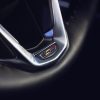 Close up of the V-Series badge on the 2023 Cadillac Escalade-V steering wheel