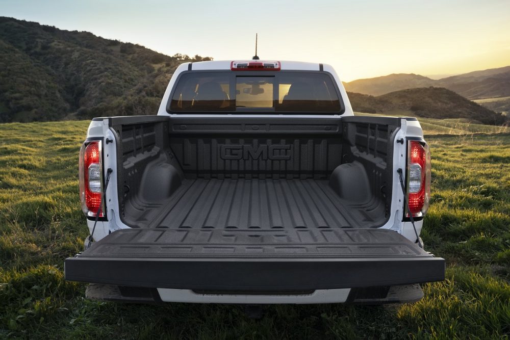 Rear view of 2022 GMC Canyon AT4 bed with open tailgate