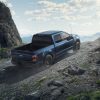 2023 Ford F-150 Rattler in Antimatter Blue ascending an incline