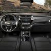 Front-facing view of 2023 Chevrolet Trailblazer front-row seats, steering wheel, dashboard, and windshield