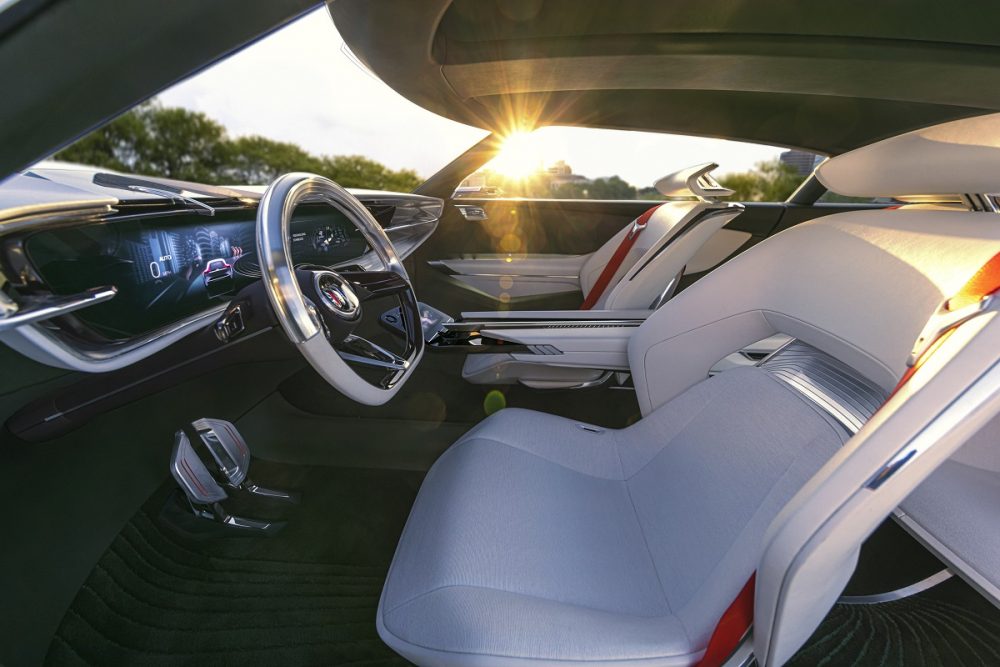 Side view of Buick Wildcat EV Concept front seats, steering wheel, console, and dash