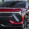 Close-up front view of red 2024 Chevrolet Blazer EV SS grille and headlights