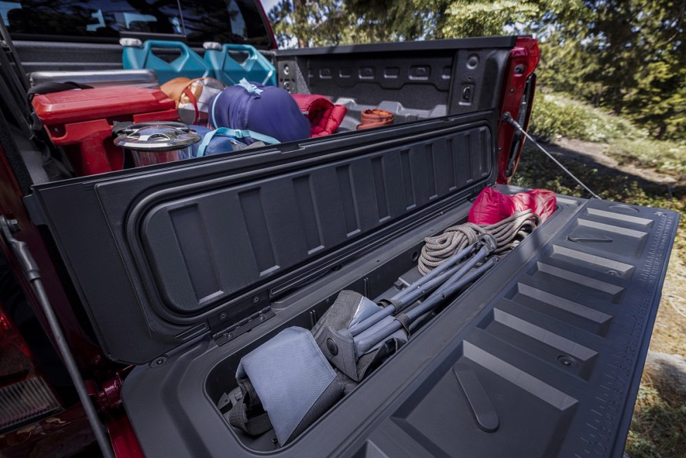 Close-up of 2023 Chevrolet Colorado Trail Boss tailgate storage compartment