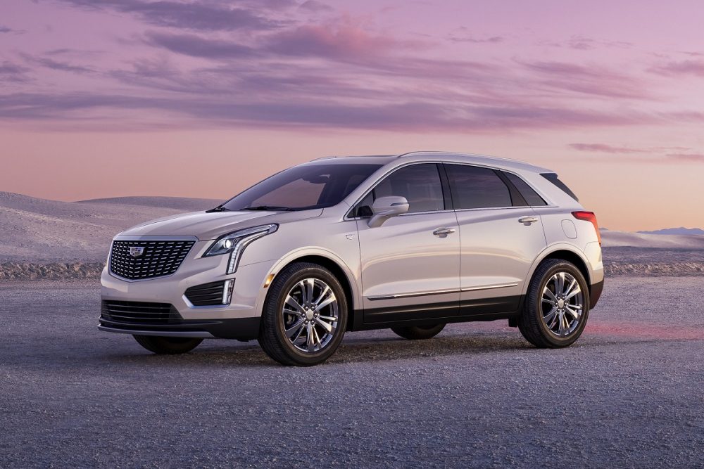 2023 Cadillac XT5 Premium Luxury shown in Crystal White Tricoat with 20” alloy wheels, front 3/4 angle