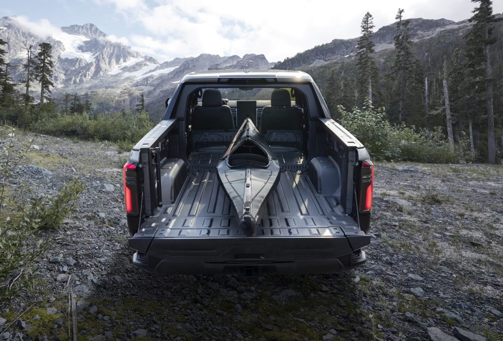 Rear view of 2024 GMC Sierra EV Denali Edition 1 and MultiPro Midgate feature