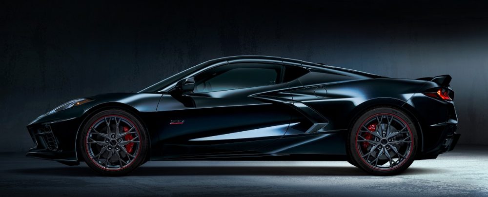 Side profile view of 2023 Chevrolet Corvette Stingray 70th Anniversary Edition coupe in Carbon Flash Metallic