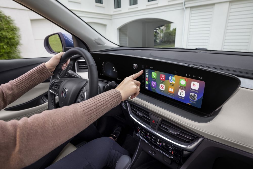 Driver interacting with the new Virtual Cockpit System in the 2024 Buick Encore GX Avenir