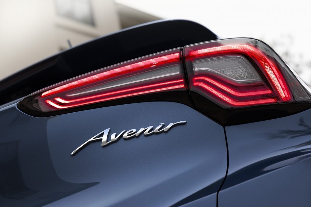 Close-up view of 2024 Buick Avenir rear passenger-side taillight and Avenir badge