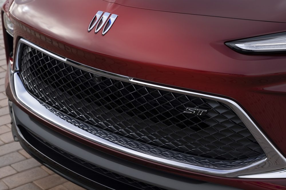 Close-up view of 2024 Buick Encore GX Sport Touring grille and new Buick tri-shield logo