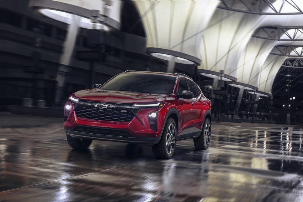 Front side view of red 2024 Chevrolet Trax RS in action