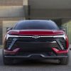 Front view of red 2024 Chevrolet Blazer EV SS with lights illuminated