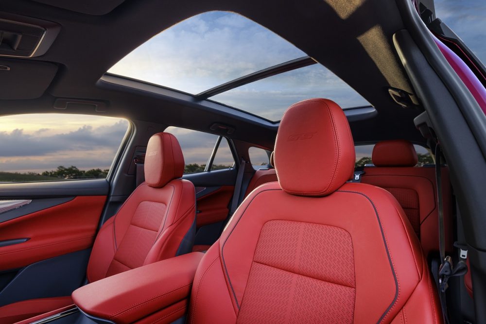 View of 2024 Chevrolet Blazer EV SS sunroof and seats upholstered in Adrenaline Red