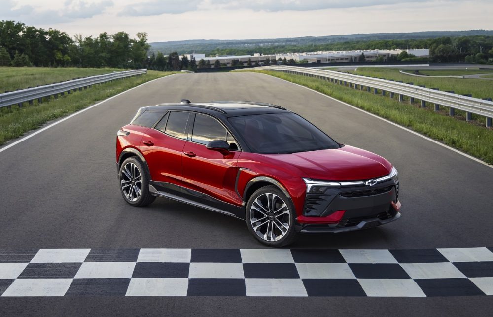 Front side overhead view of red 2024 Chevrolet Blazer EV SS parked at track finish line