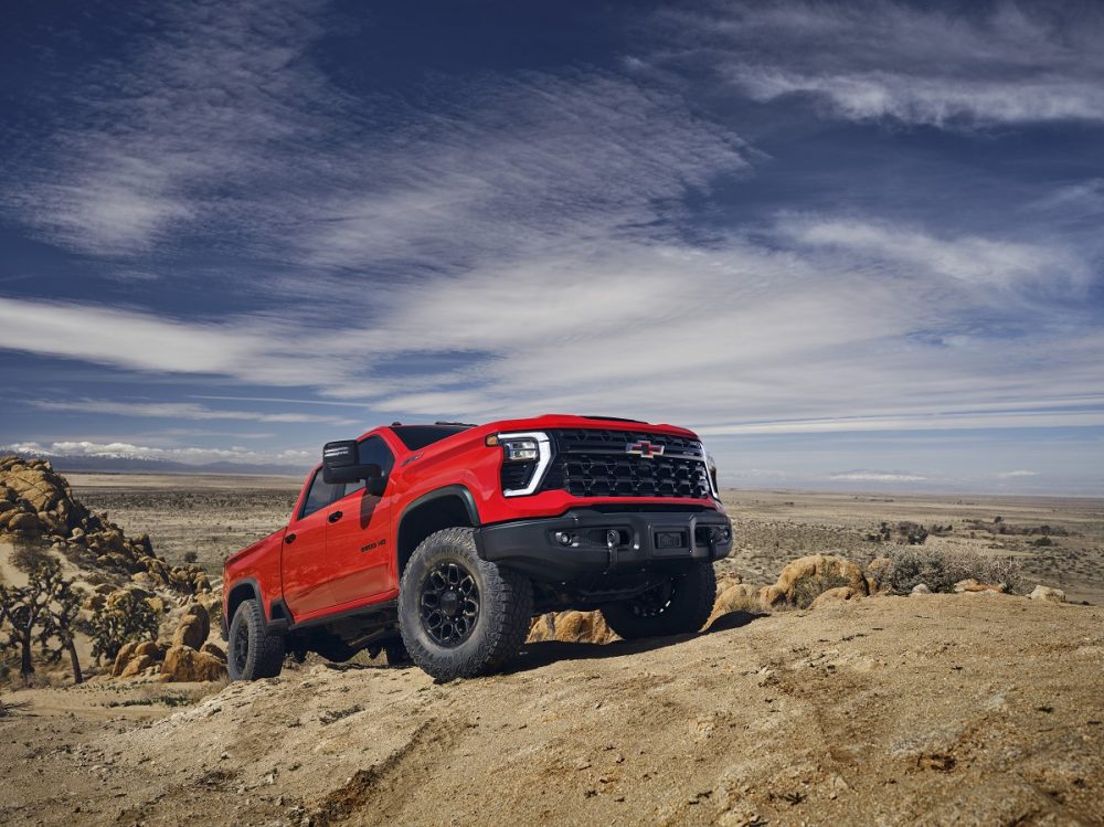 Front side view of 2024 Chevrolet Silverado HD ZR2 Bison climbing a trail