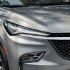 Close-up view of 2024 Buick Enclave Avenir LED headlamps and daytime running lamps