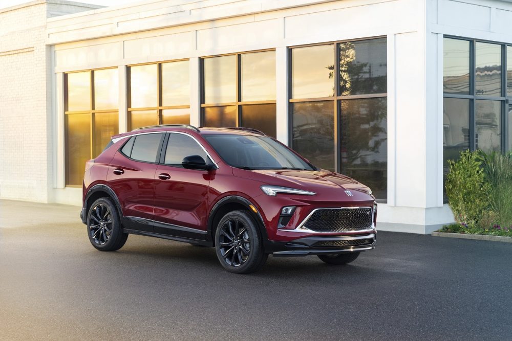 Front 3/4 view of the 2024 Buick Encore GX ST in Cinnabar Metallic