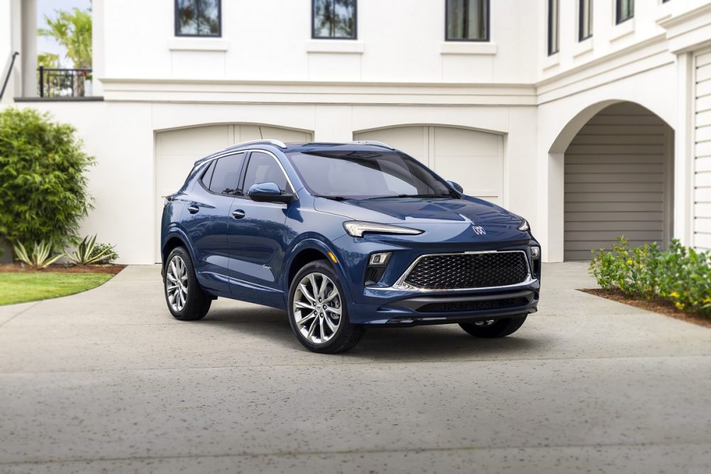 Front 3/4 view of the 2024 Buick Encore GX Avenir in Ocean Blue Metallic