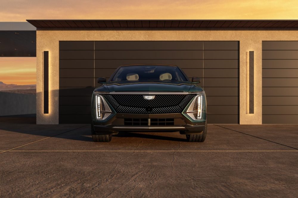 Front view of the 2024 Cadillac LYRIQ Luxury trim with front grille illuminated.