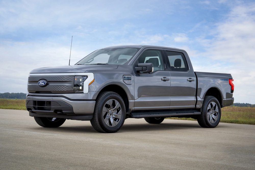 Ford is expanding the 2024 F-150 Lightning lineup with the Flash, a new model that will slot in below the Lariat at a $69,995 price point. The F-150 Lightning Flash is a tech-loaded bridge between the XLT and Lariat that offers 320 miles of max range, Ford BlueCruise hands-free, and a 15.5-inch touch screen. 
Considering a Ford F-150 Lightning? Get the answers to your questions about Ford EVs
According to Ford Model e COO Marin Gjaja, the Ford F-150 Lightning Flash came about after the automaker polled customers about what they wanted from the all-electric truck. 
“The F-150 Lightning Flash is a direct outcome of engaging with and learning from our customers. This truck combines many of the technology-forward features our customers love in our EV lineup, at a more accessible price,” said Gjaja. “With an EPA-estimated 320 miles of range, the Lightning Flash is another example of the speed at which we are adapting to grow our EV business.”
Features standard for the F-150 Lightning Flash include an eight-speaker B&O Sound System, Intelligent Access with Push-Button Start, and wireless smartphone charging. It’ll also come with the Tow Technology Package with essentials like Smart Hitch, Onboard Scales, and Pro Trailer Backup Assist. 
Ford also announced pricing for the remainder of the 2024 F-150 Lightning lineup, revealing that the commercial-friendly Pro will stay pat at $49,995 and the Platinum will see a modest price cut to $89,995. The F-150 Lightning XLT goes from $54,995 to $57,495, and the Lariat gets a bump from $69,995 to $77,495. The 2024 F-150 Lightning will also be offered in a limited-edition Platinum Black model that starts at $97,995. 
Ford will open up order books for the 2024 F-150 Lightning in January. 
