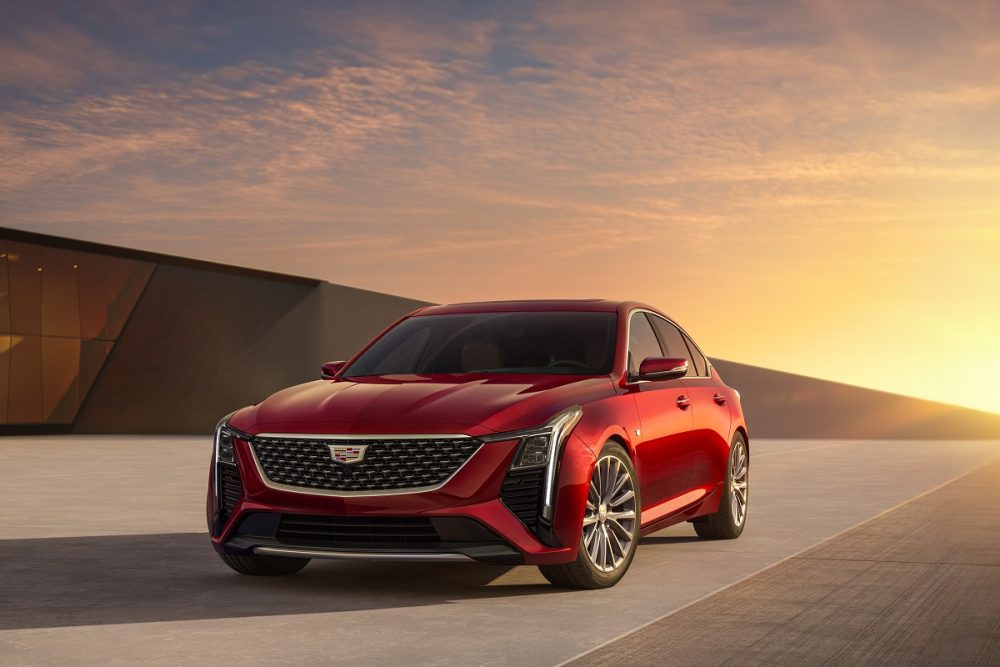 Front 7/8 view of the 2025 Cadillac CT5 Premium Luxury in Radiant Red Tintcoat.