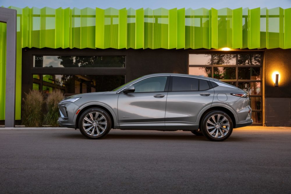 Profile view of gray 2024 Buick Envista Avenir parked in front of building