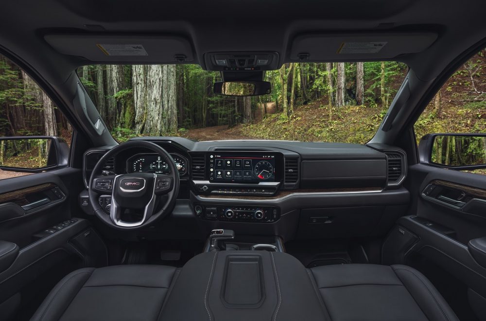 Steering wheel, dashboard, and front seats of 2024 GMC Sierra 1500 in Jet Black