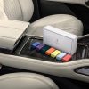 Lincoln Digital Scent hero shot with all seven cartridges sitting next to the center console of a 2024 Lincoln Nautilus