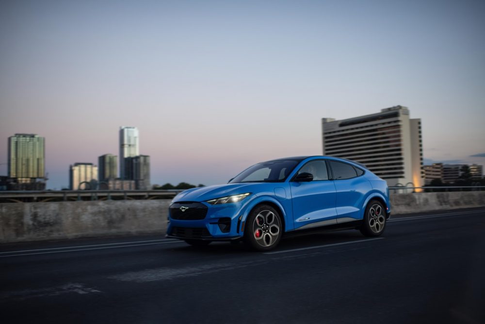 Action shot of a 2024 Ford Mustang Mach-E in Grabber Blue