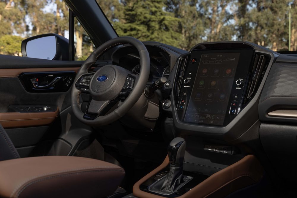 Interior view of the 2025 Subaru Forester steering wheel and infotainment screen