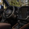 Interior view of the 2025 Subaru Forester steering wheel and infotainment screen