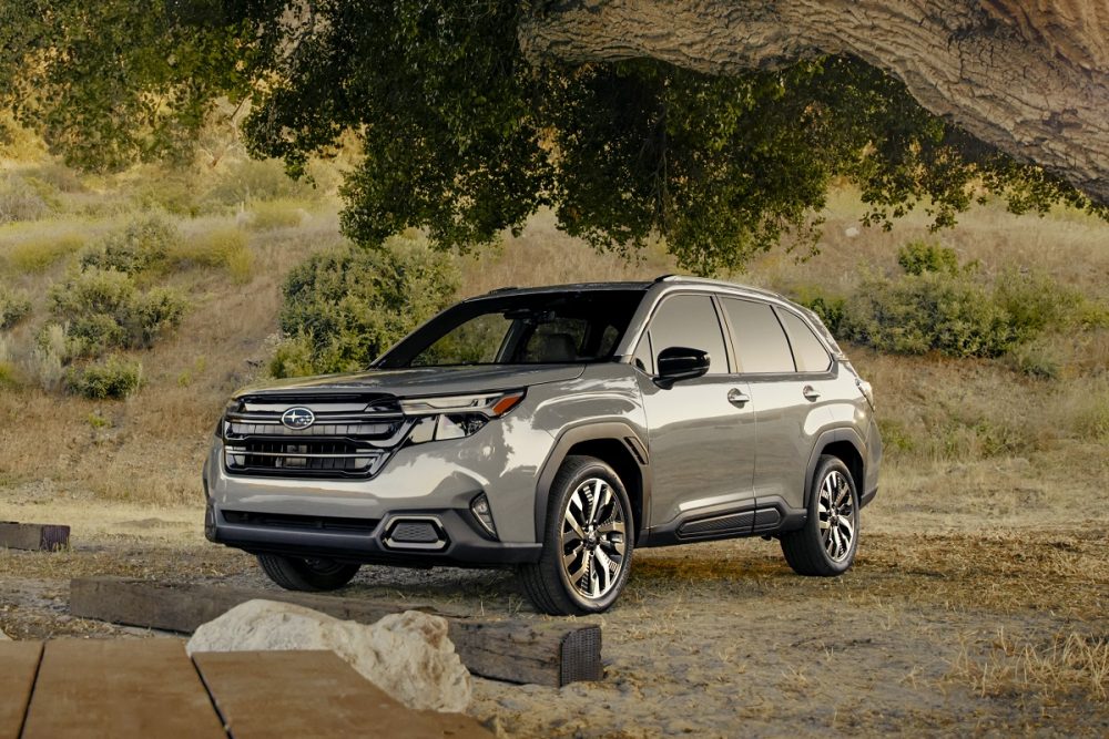 Front 3/4 view of the 2025 Subaru Forester parked in nature