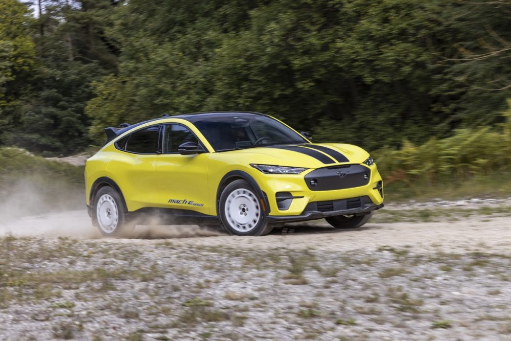 Action shot of a 2024 Ford Mustang Mach-E Rally in Grabber Yellow