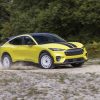 Action shot of a 2024 Ford Mustang Mach-E Rally in Grabber Yellow