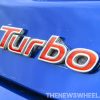 Car with red turbo badge turbocharged engine explained