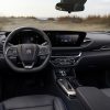 A view of the 2024 Buick Envista Sport Touring front row, including seats, steering wheel, and dashboard